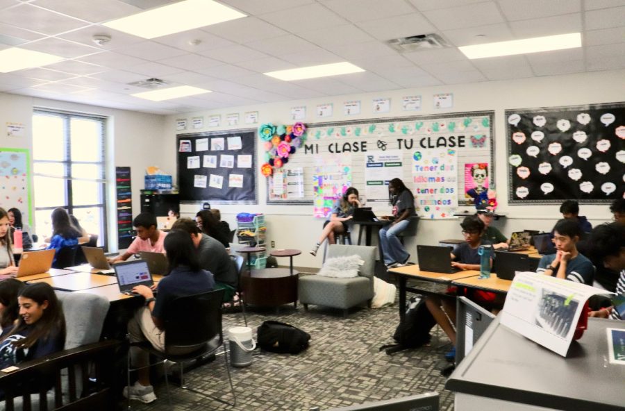  Mrs. Kubic’s Spanish I class working on the first major grade Spanish project of the school year. Photo By: Maya Borkar