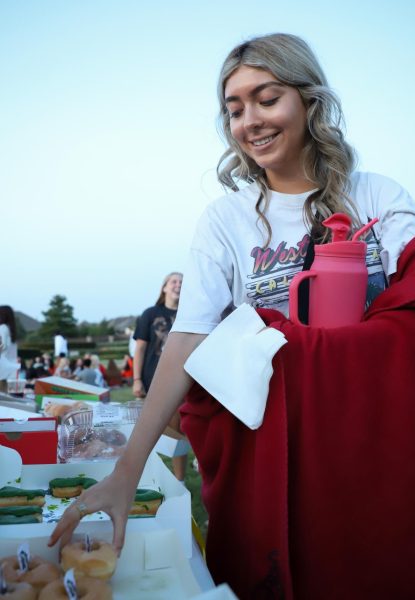 Senior Ana Sofia Salazar organized the food during Senior Sunrise. [August 3rd, 2023]
