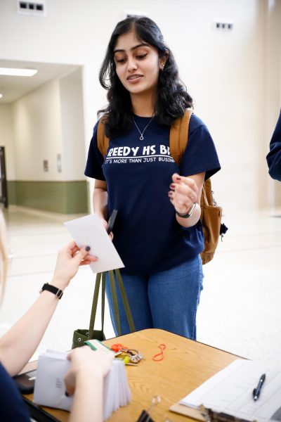 Junior Siri Ganapathineedi is waiting to get on the bus for the BPA state competition. Since her freshman year, she has been an active member of Reedys BPA, competing in fields ranging from economic research to financial management and computer networking.