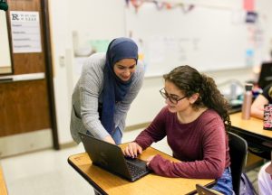 Advanced placement biology teacher Anun Jiwani instructs senior Alexandra Younani.
