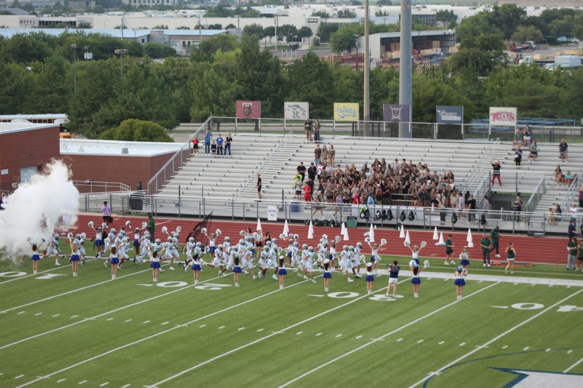 Reedy varsity football team played against Wakeland on September 18. Every game, the team runs out of a lion's mouth to the cheers of the audience.