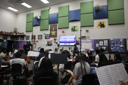 The Reedy Orchestra is preparing for their performance. They have worked hard to arrange a fantastic show.