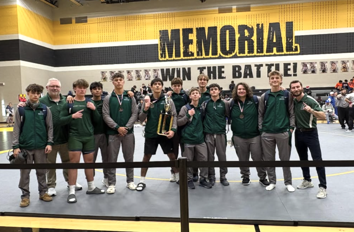 Reedy Wrestling after winning a competition. They worked hard in their preseason to ensure success.
